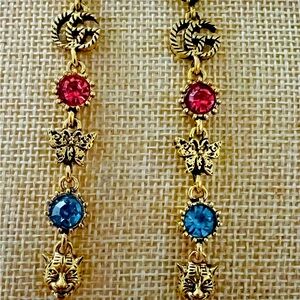 Fashion unbranded dangling pierced earrings.